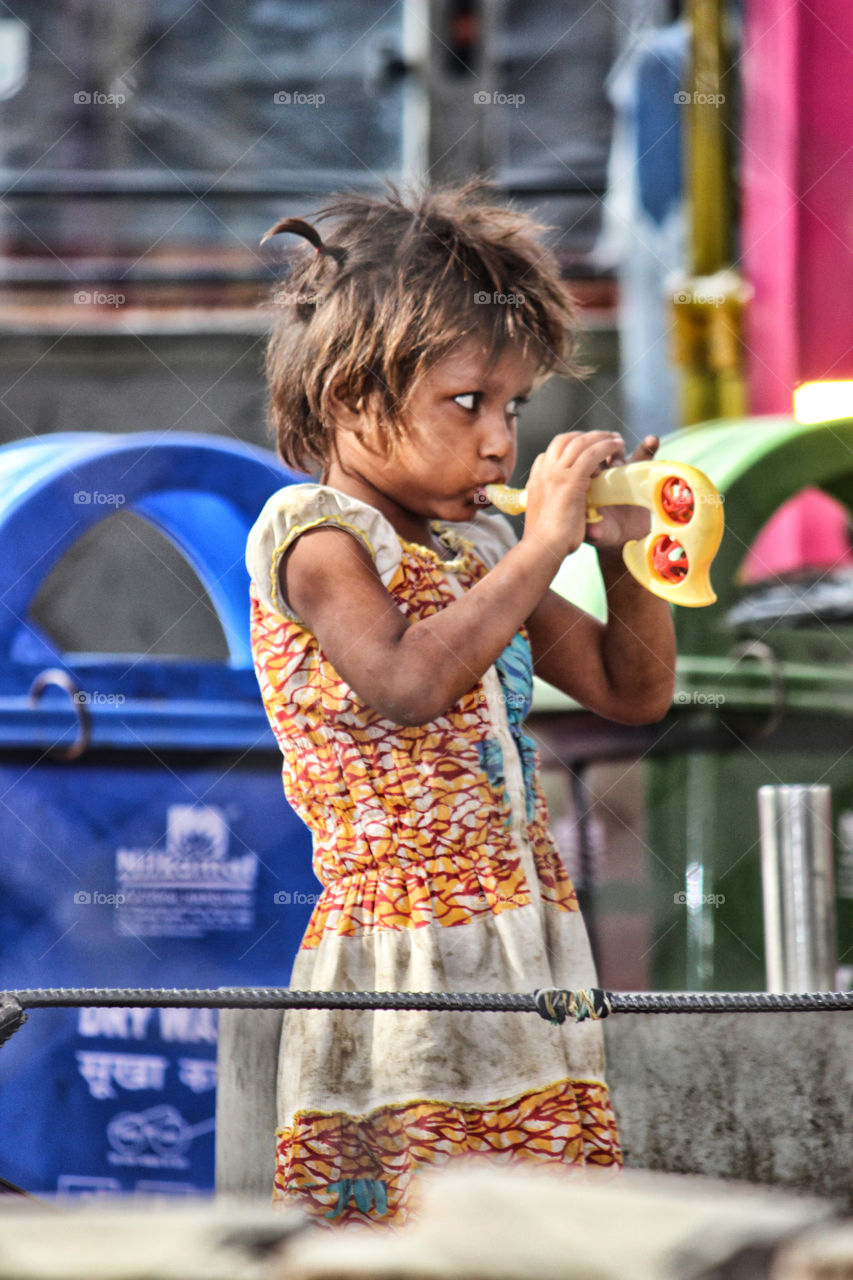 girl playing a toy