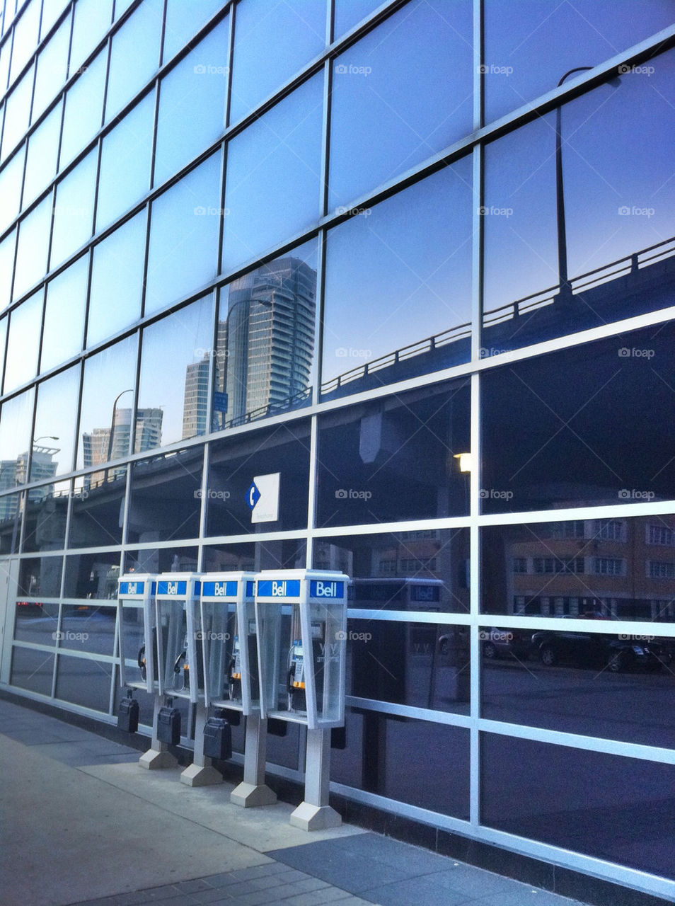 city blue windows skyscraper by cyrano