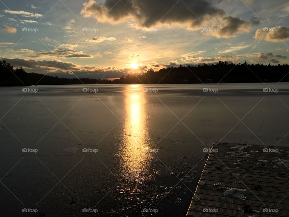 Frozen lake sunsets