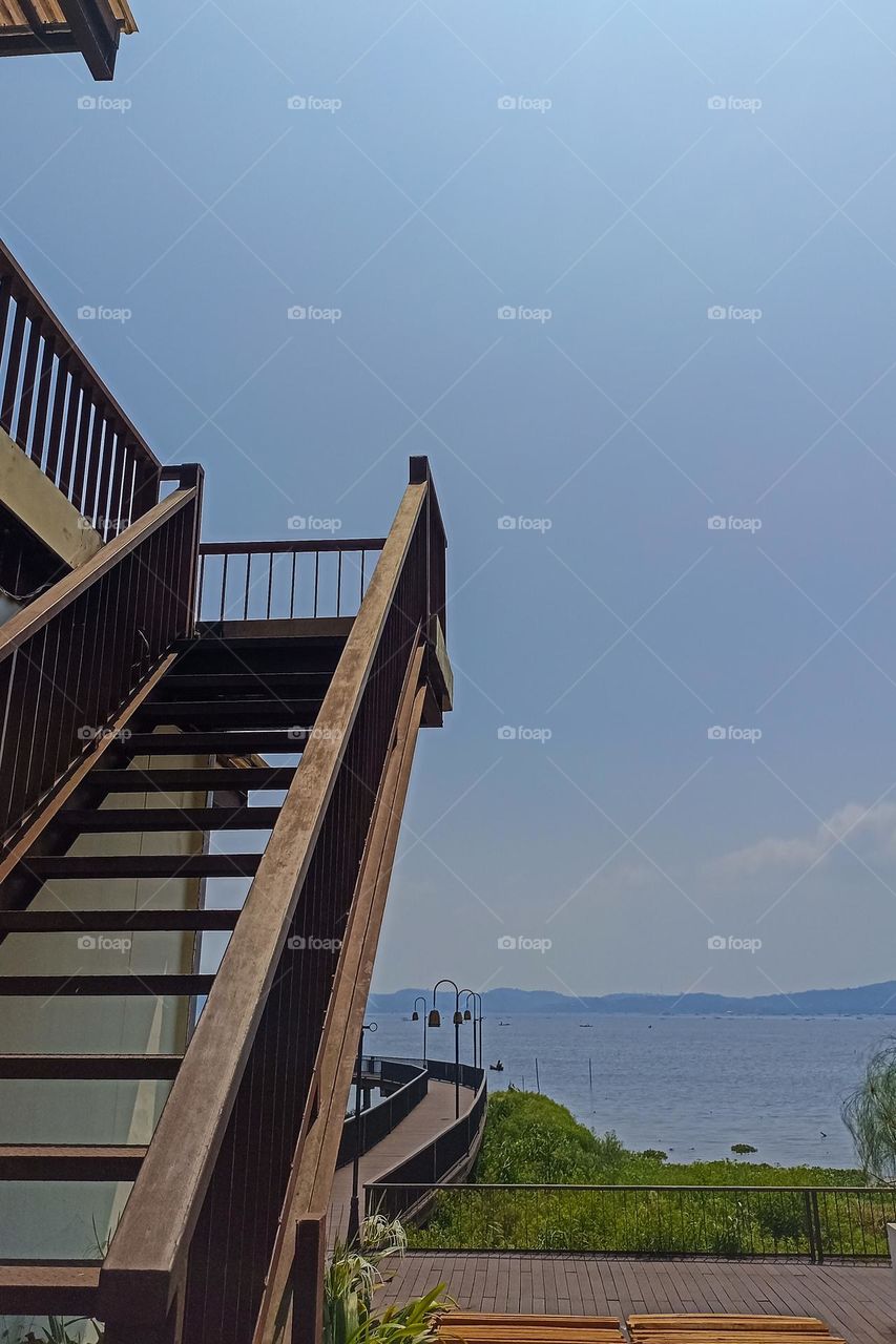 Wooden stairs with swamp background in eye level view