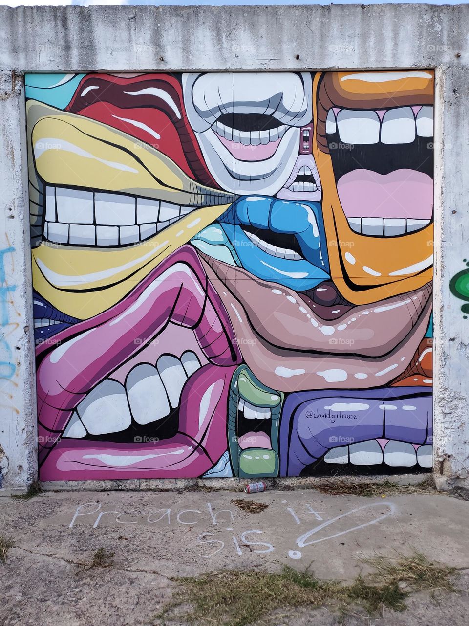 Outdoor art mural with colorful lips