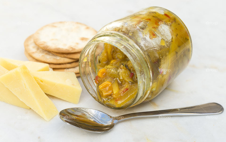 Mustard pickles with cheese and crackers