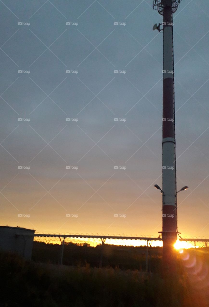 wireless pole at sunrise