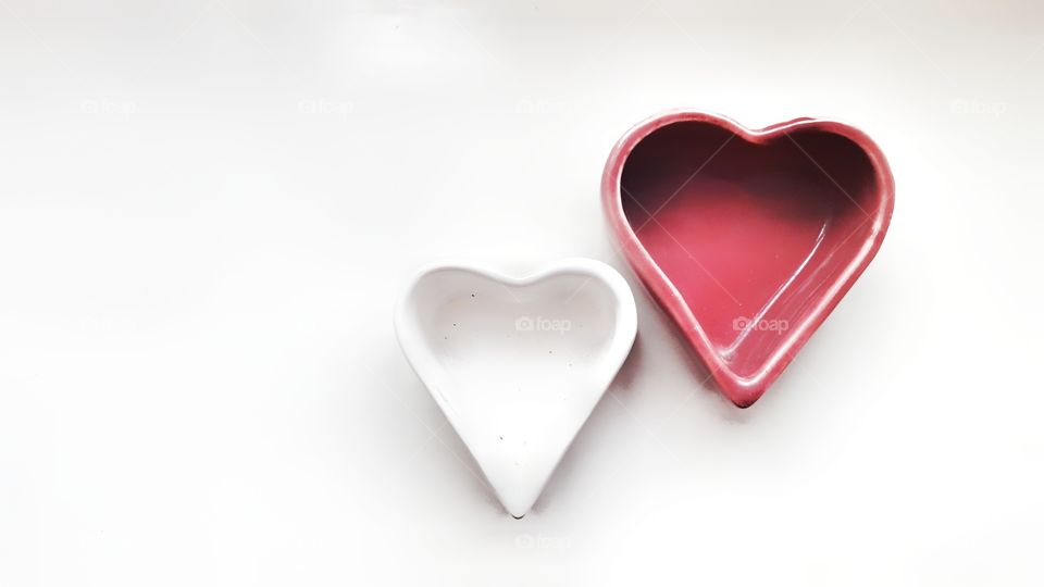 Two hearts in a white background