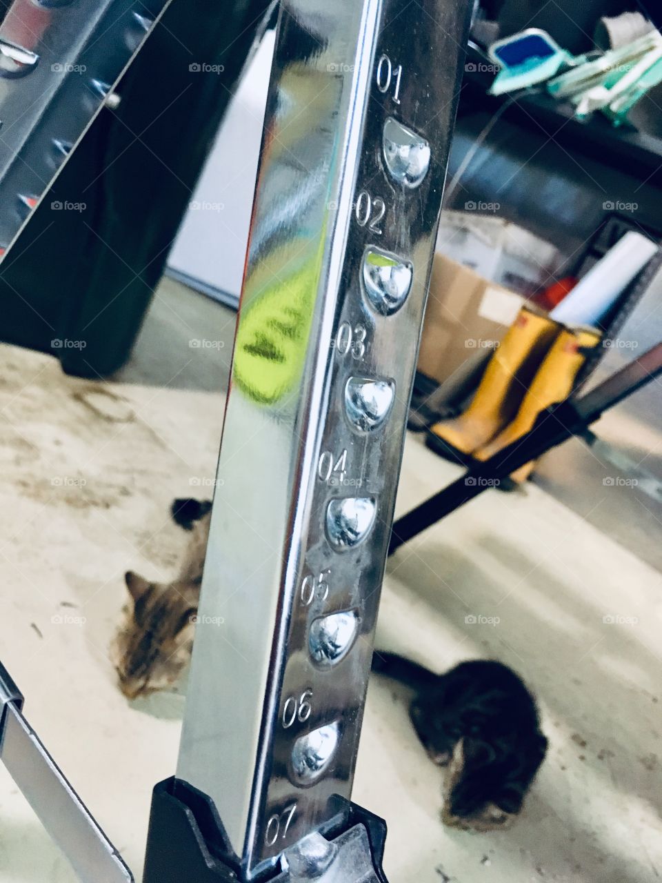 Numbers on a silver metal beam