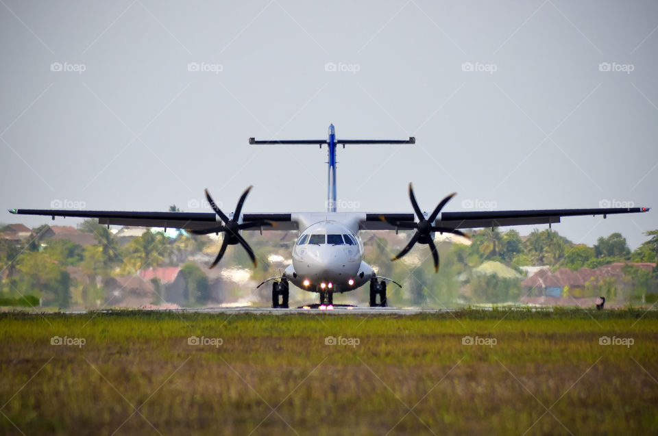 Garuda atr aircraft landed at an airport....
