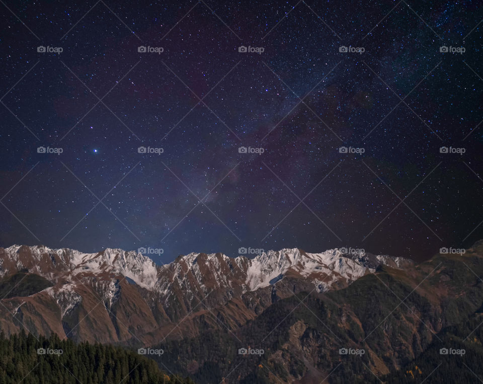 Milky way abovebeautiful mountains scape in Georgia