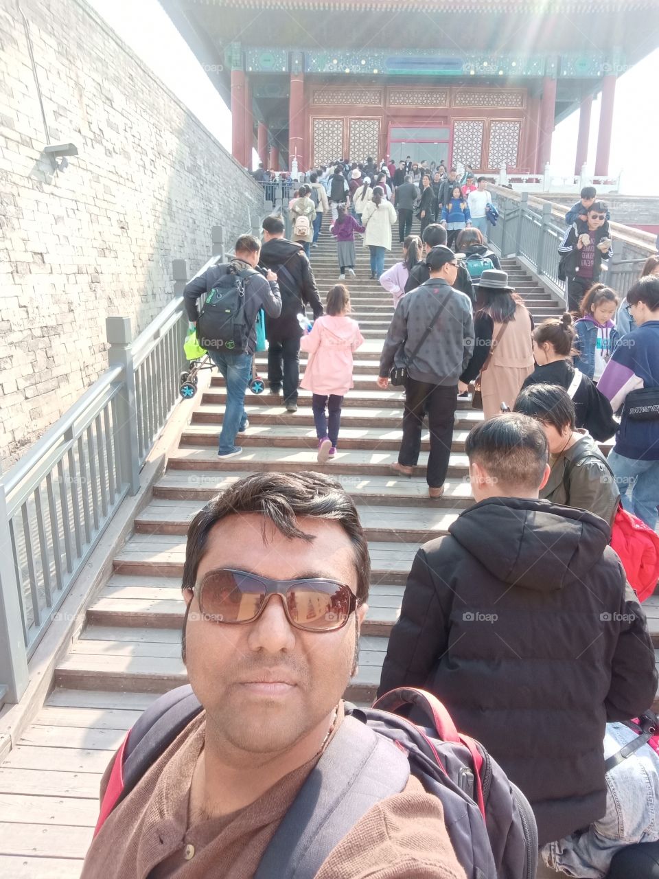 Selfie on the way of Staircase at Forbidden City in China