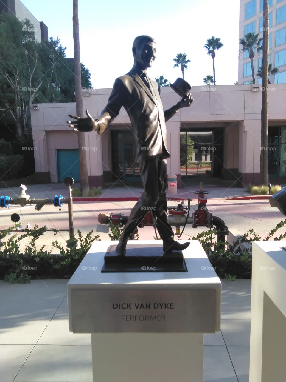 a commemorative metal statue of Dick Van Dyke, on-site at the Television Academy