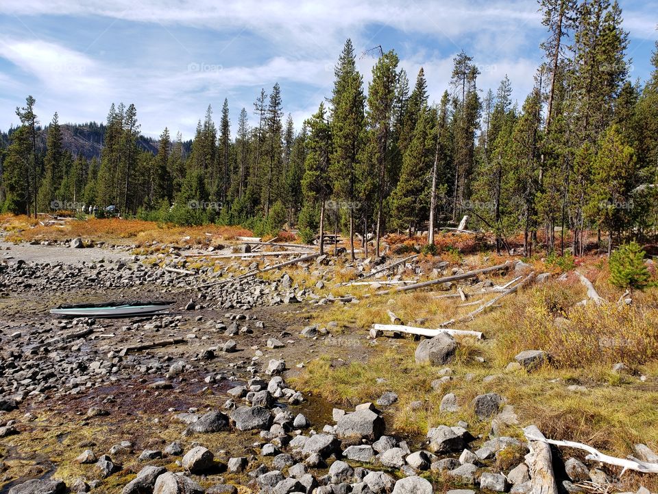 Brilliant fall colors of a landscape on the shores of Elk Lake in Oregon’s Cascade Mountains