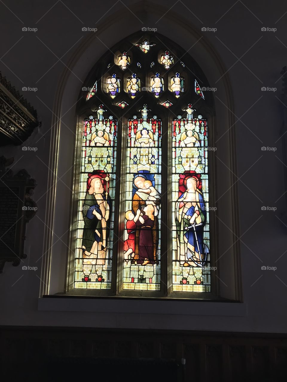 Lovely stained glass window of St Mary’s Church, Uffculme, Devon, UK