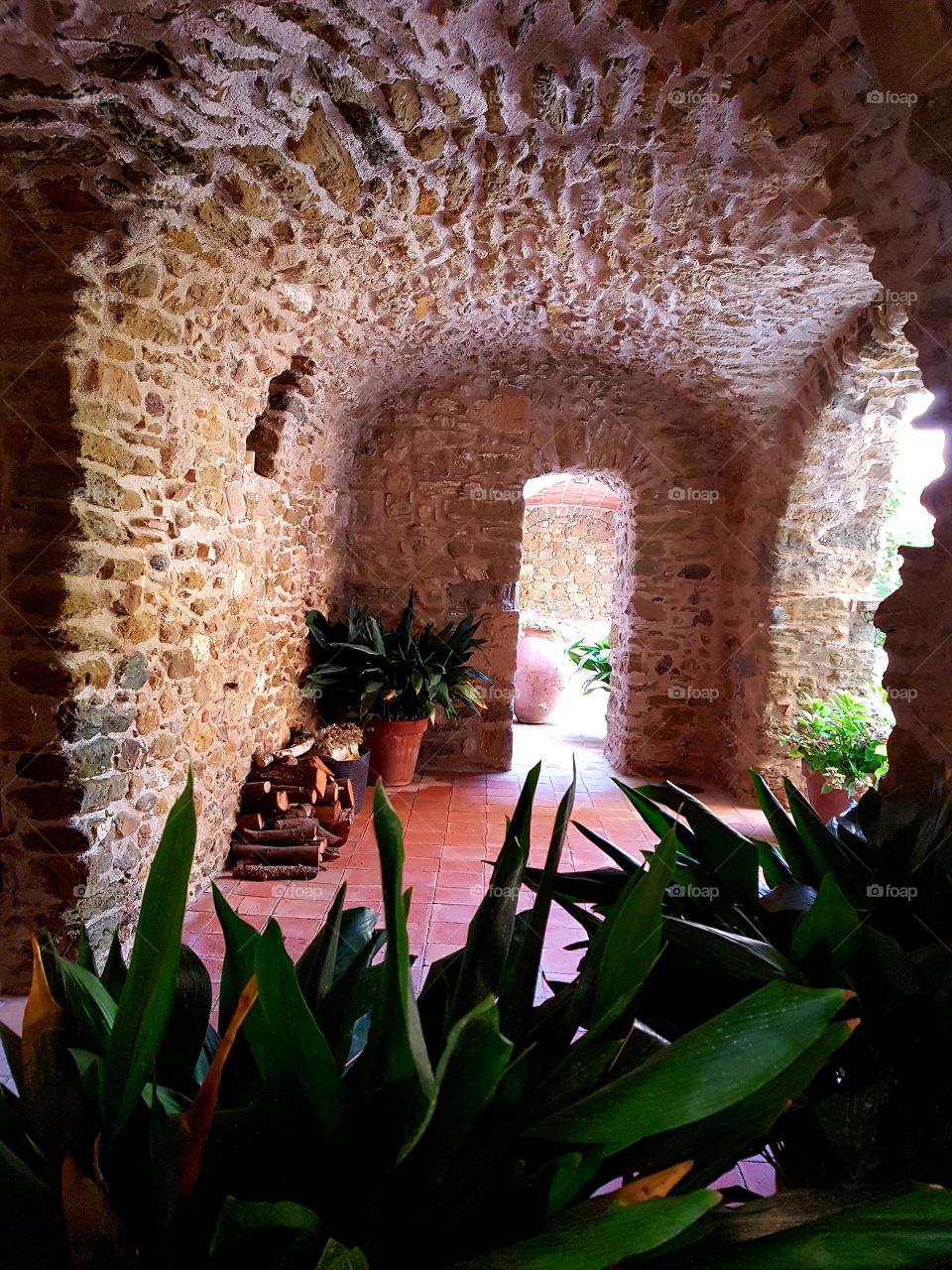 fresh stone archs, interior garden at Monells, Catalonia