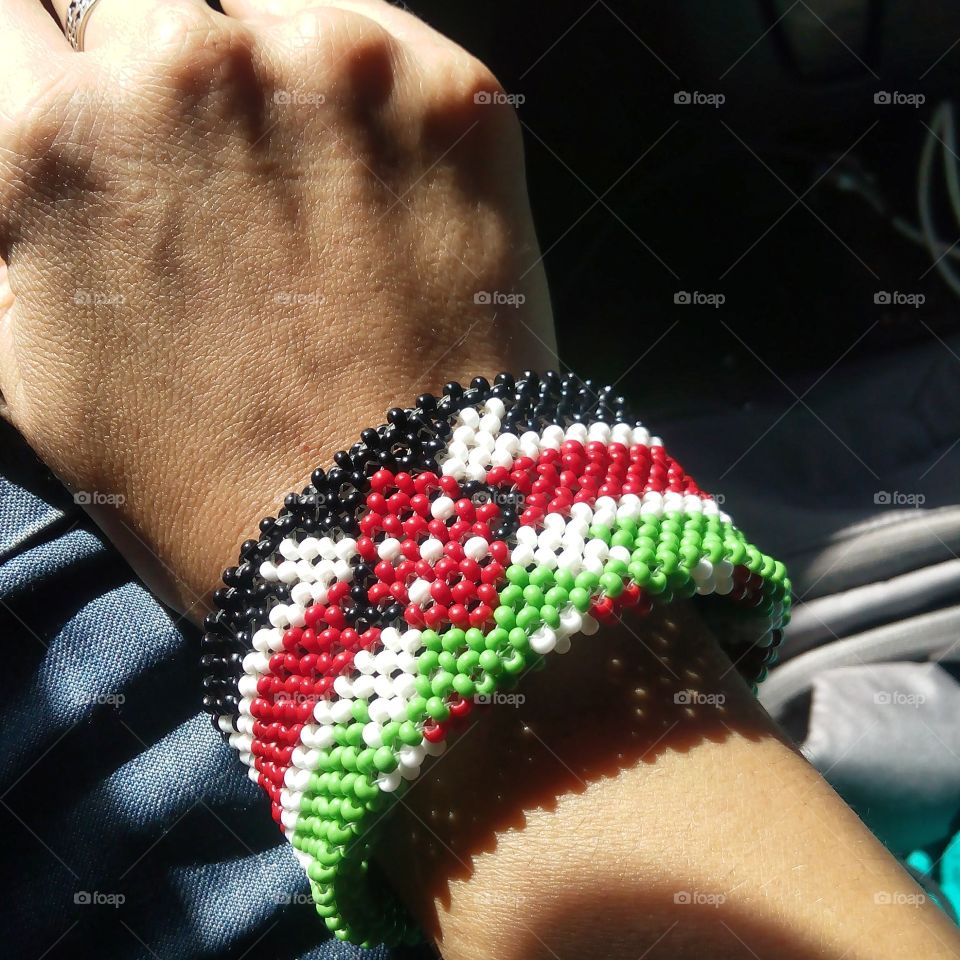 Africa in my heart, flag bangle on my hand