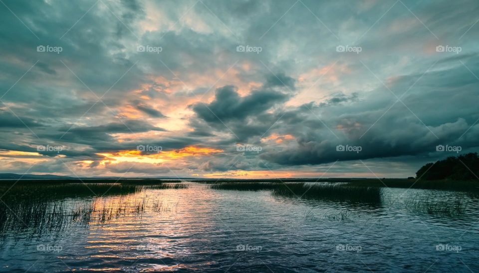 Cloudy sunset at Corrib lake in Galway, Ireland