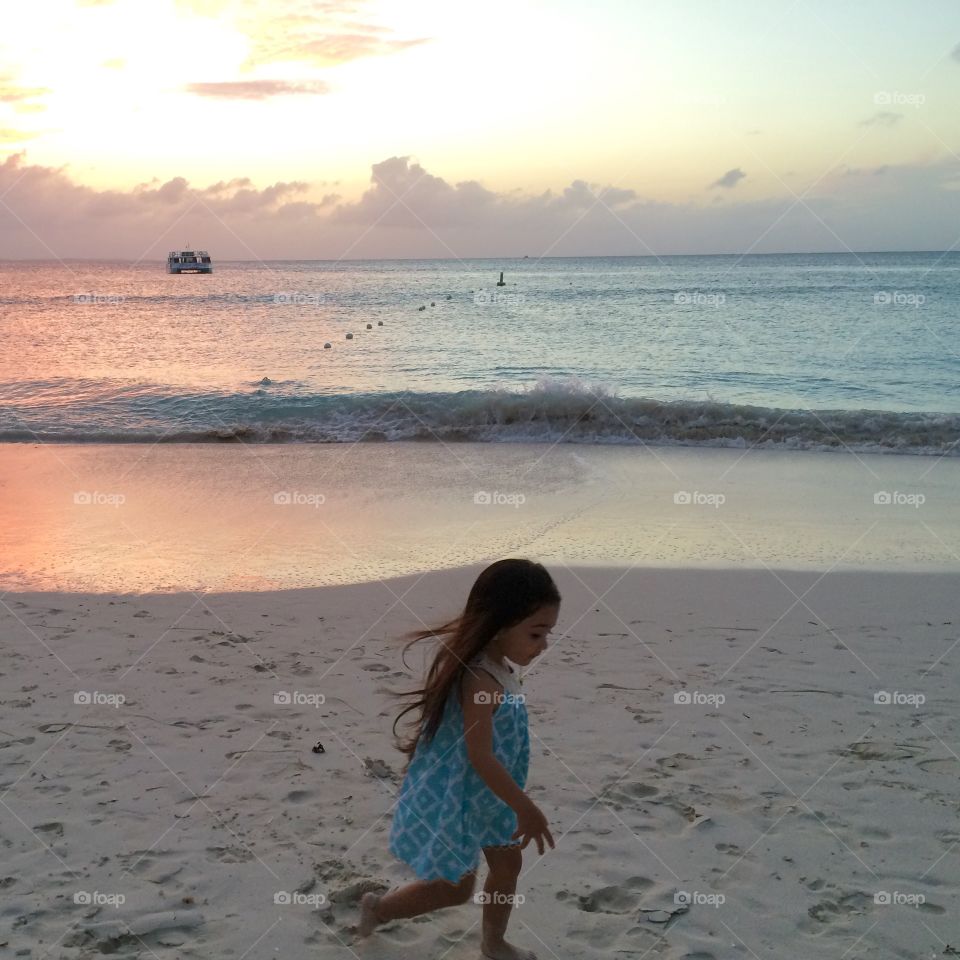 Beach baby at sunset 