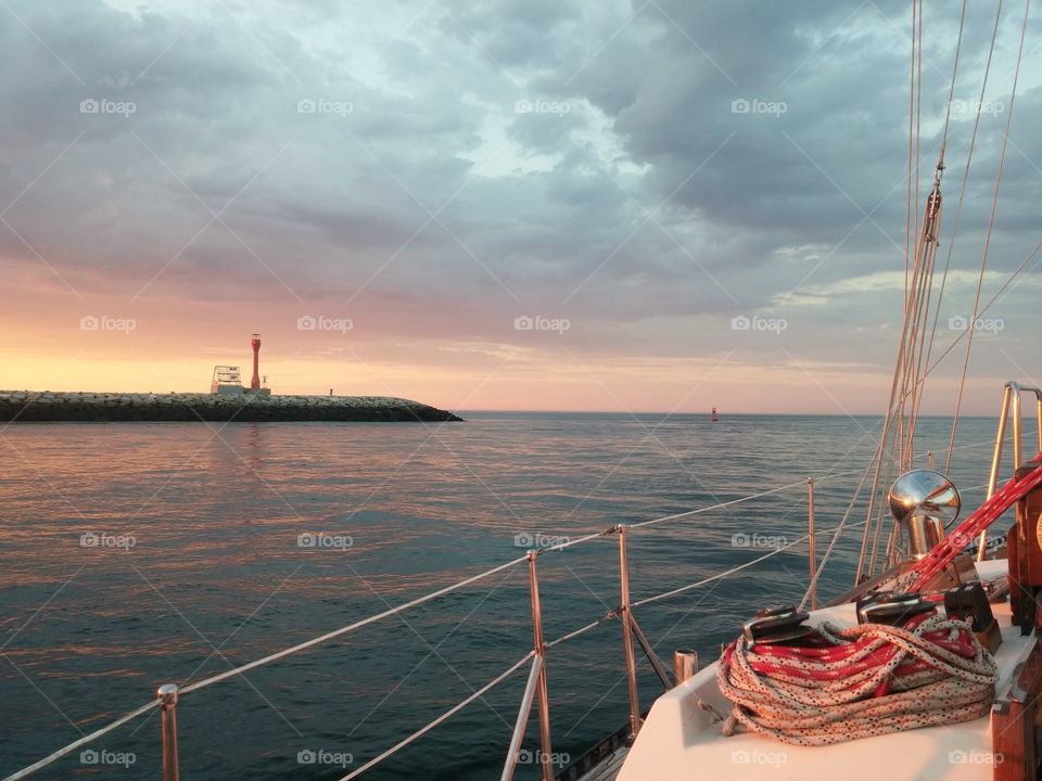 Rounding the Cape. Coming out of the Cape Cod Canal at sunset.
