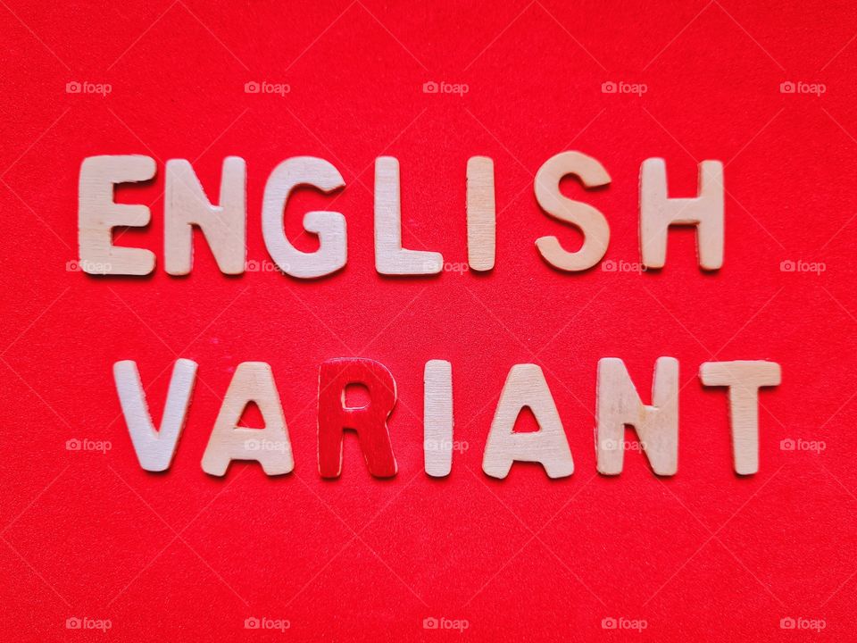 written english variant  on a red background