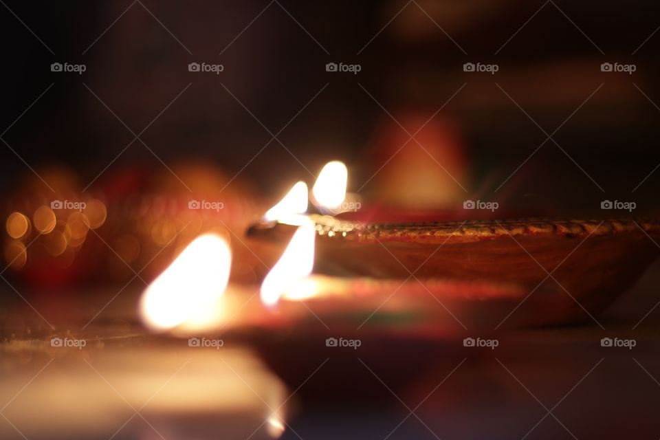 Diwali
Diwali a festival of light and prosperity is celebrated in India on a wide scale. The orange colour light from the earthen (diya) lamp was creating a very beautiful and auspicious feeling.
