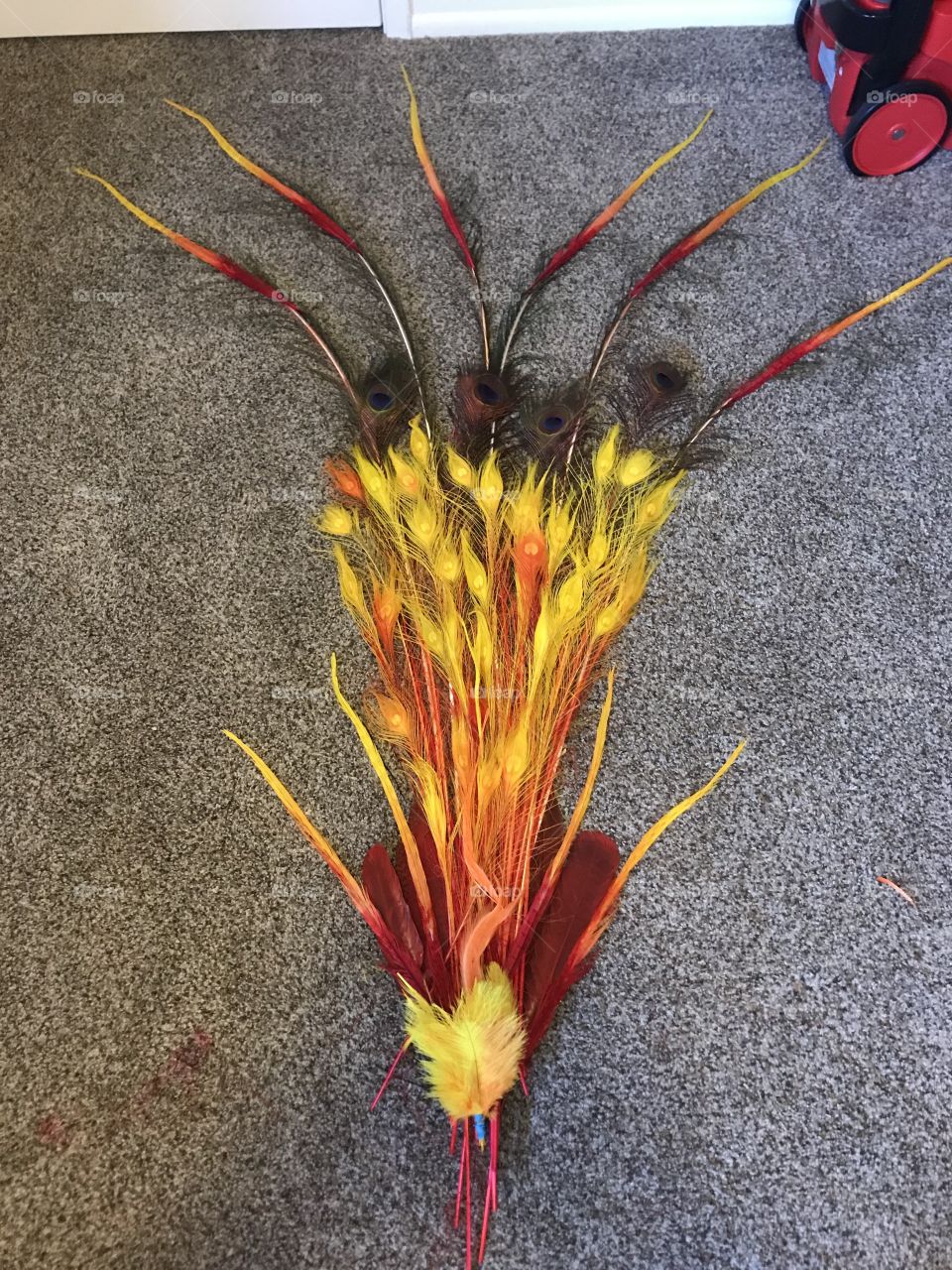 Hand made Fire bird costume tail with custom dyed feathers 