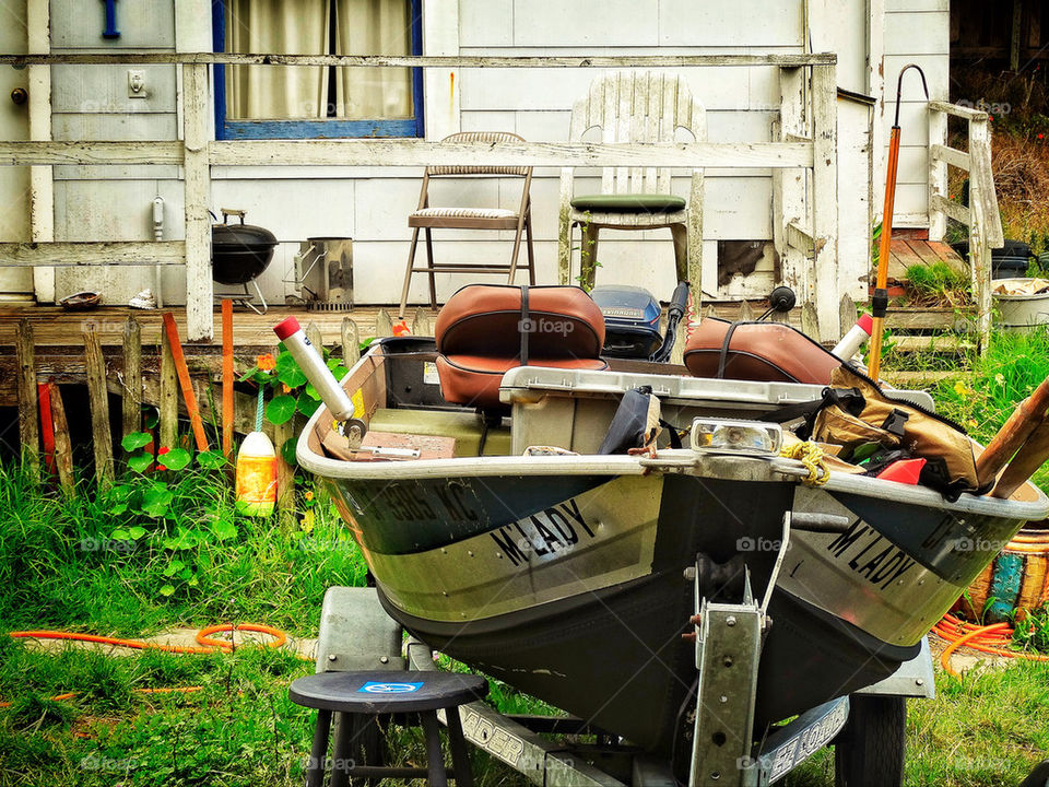 Fishing boat in a run down yard