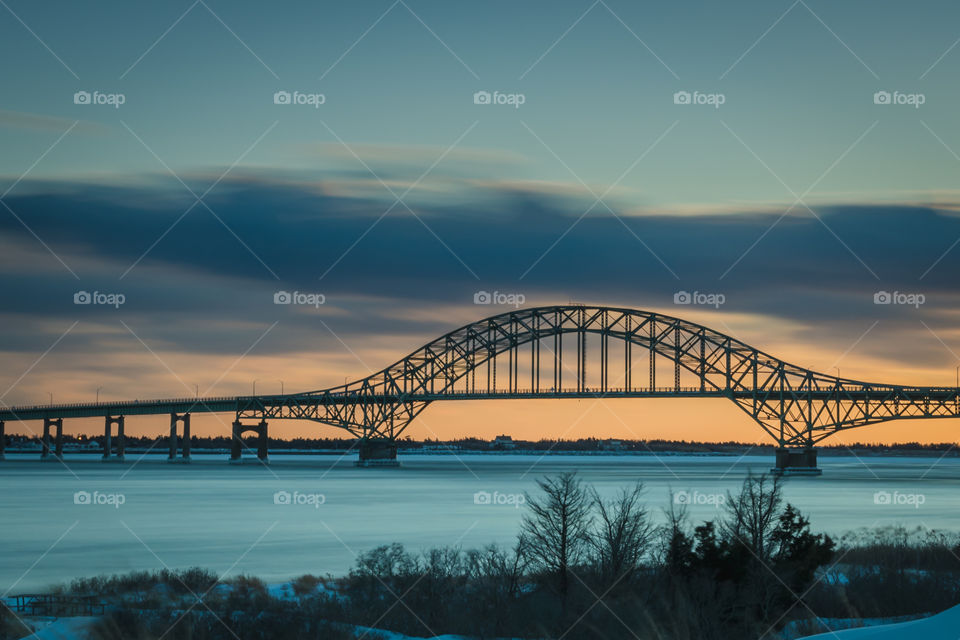 Fire island inlet bridge at sunset.