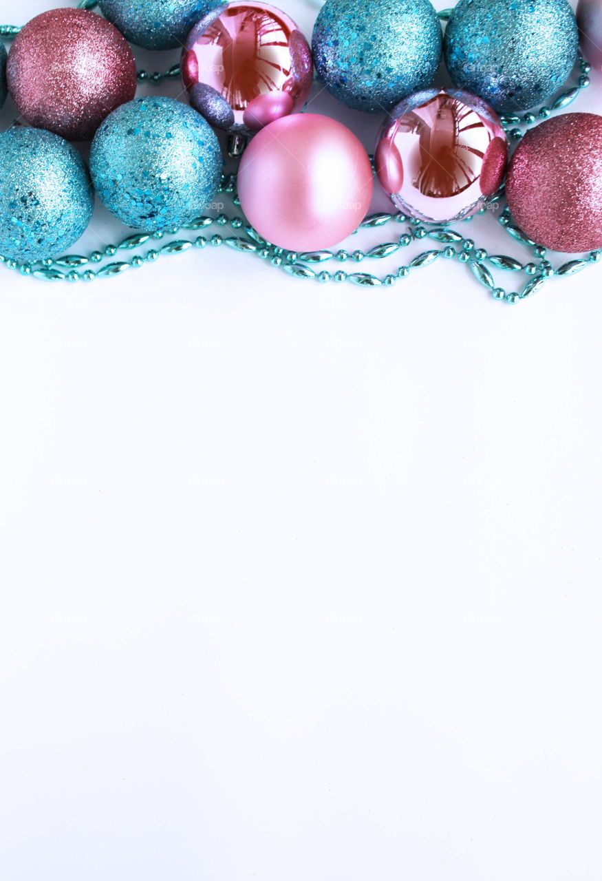 Colorful shiny Christmas balls decoration on white background