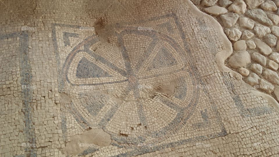 detail of mosaic in 1st century synagogue in Migdal, Israel. also known as Magdala