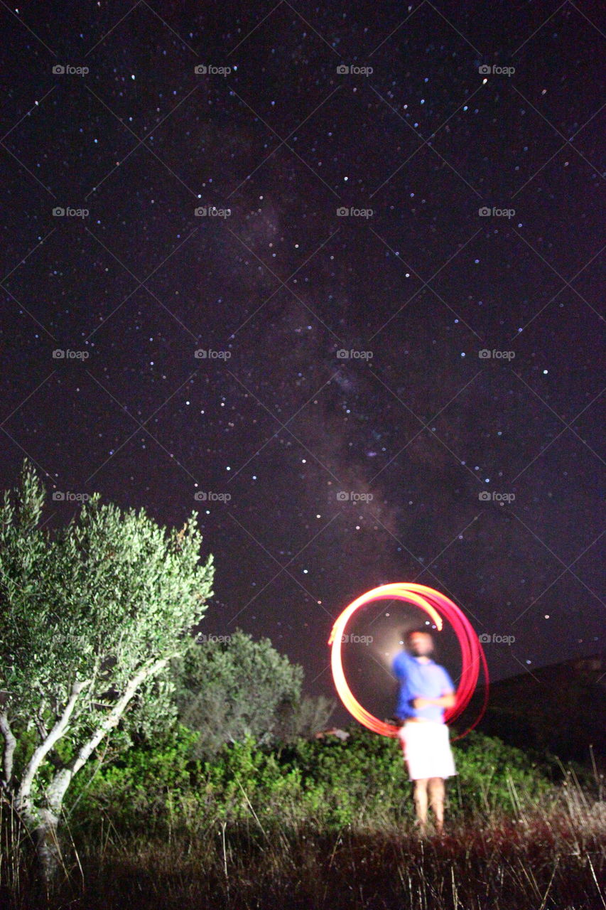 Light painting under the milky way