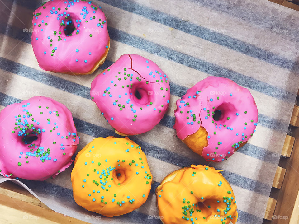 Pink and yellow donuts 