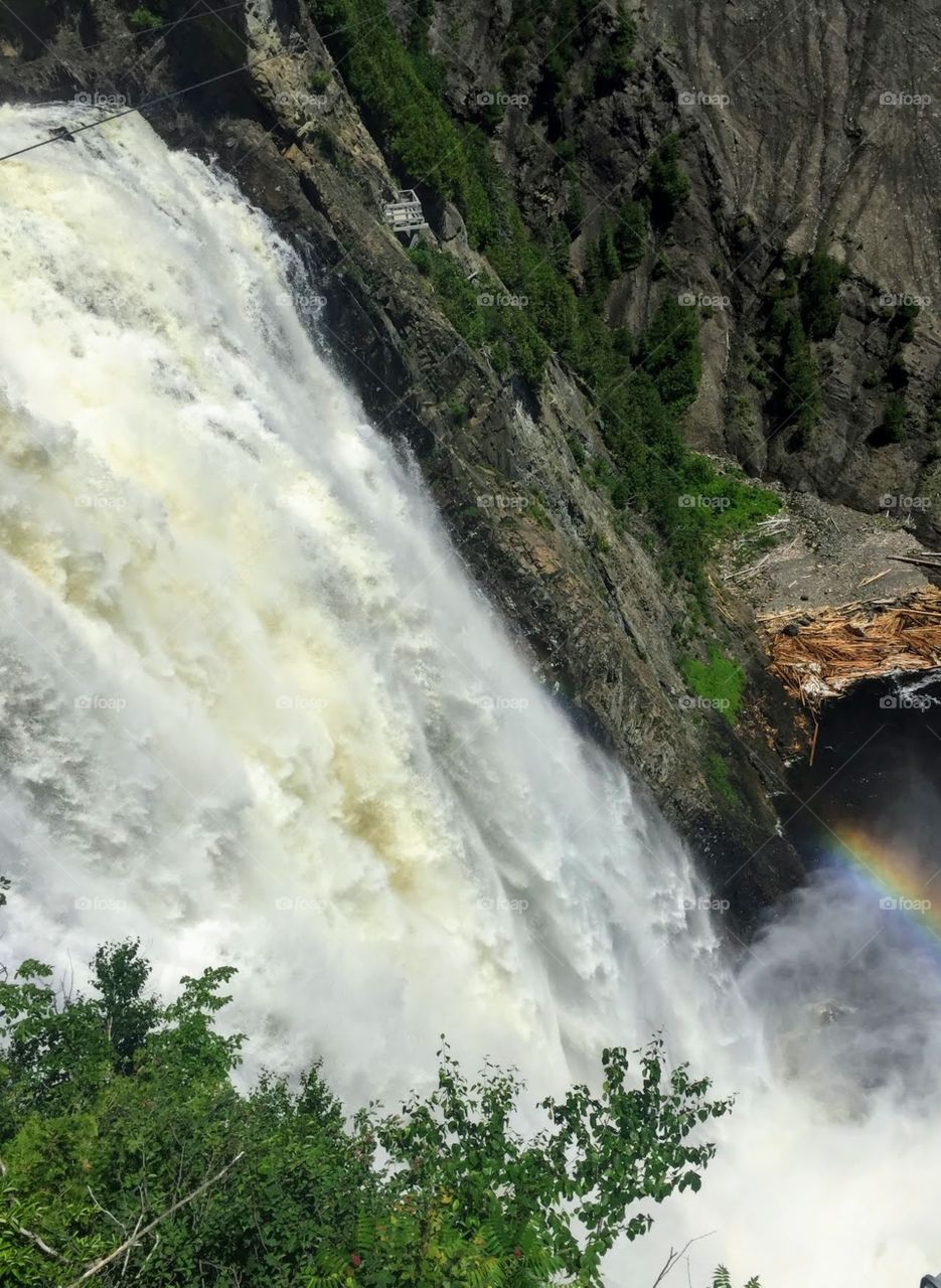 Waterfall creating a rainbow
