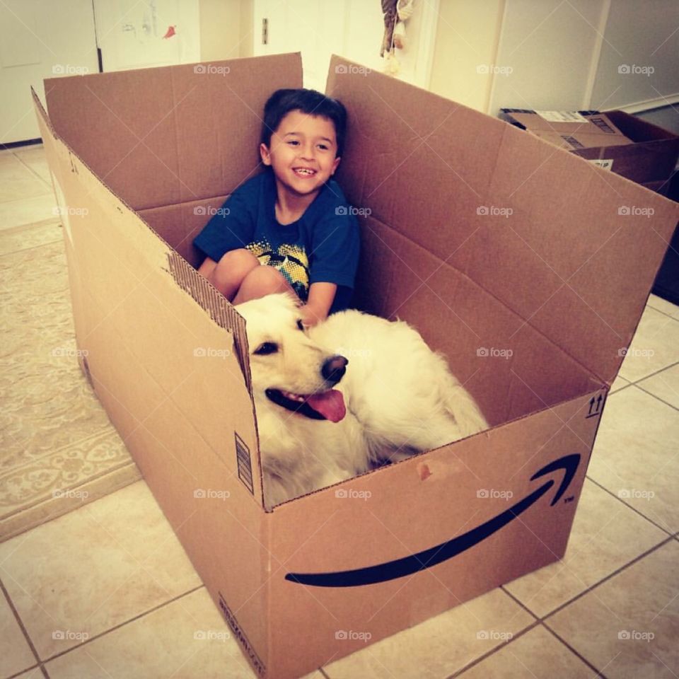 Just a boy and his dog in a box~