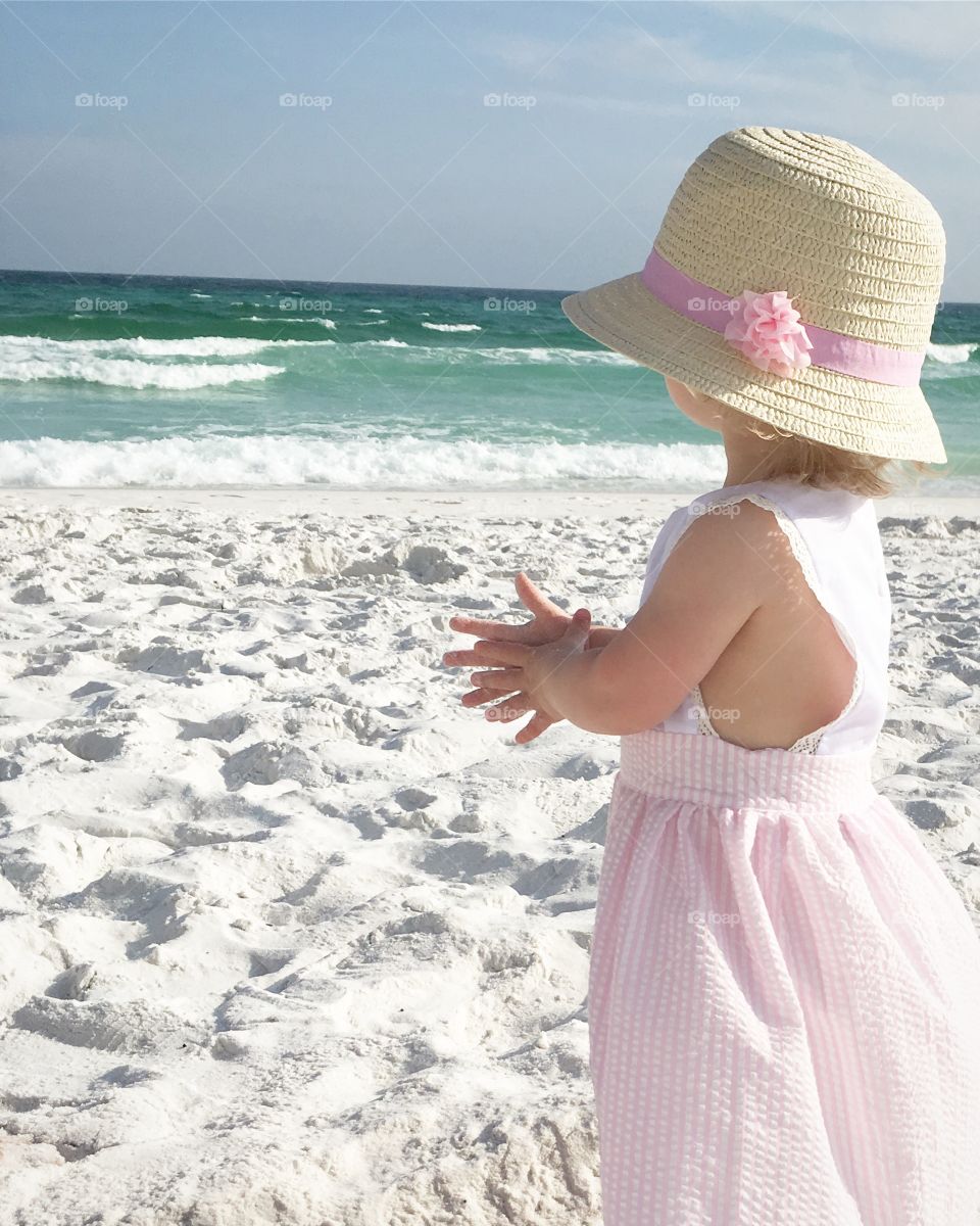 Beautiful beach baby by the sea