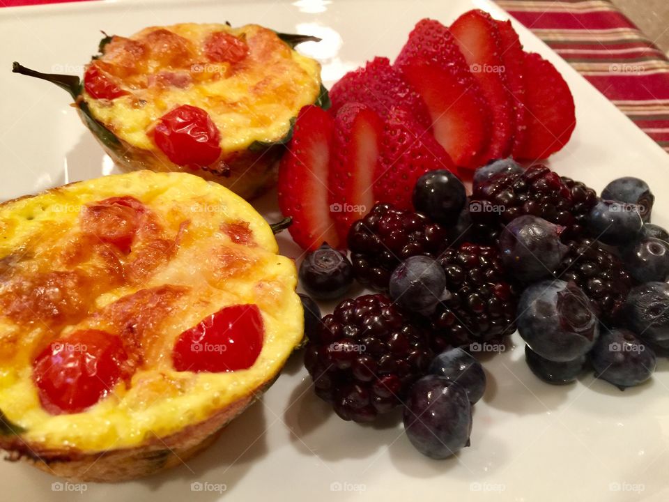 Eggs & Vegetable muffins and enjoyed with fresh strawberries, blueberries & blackberries 