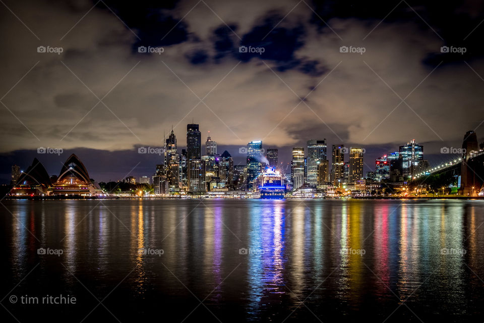 Clouds, CBD skyline and reflections on Sydney Harbour... all witnessed in the peaceful solitude of the early hours 