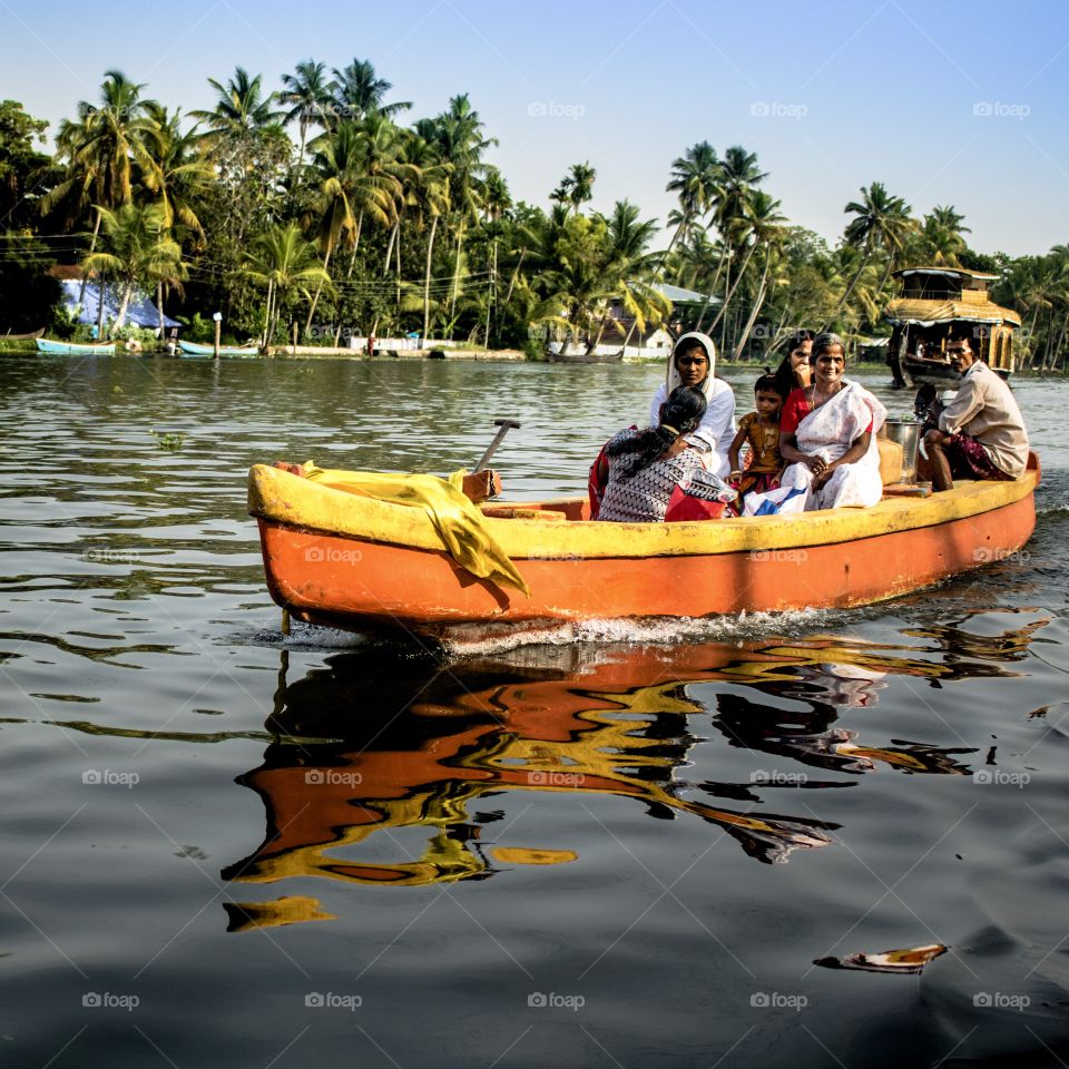 Group of people sitting in boat