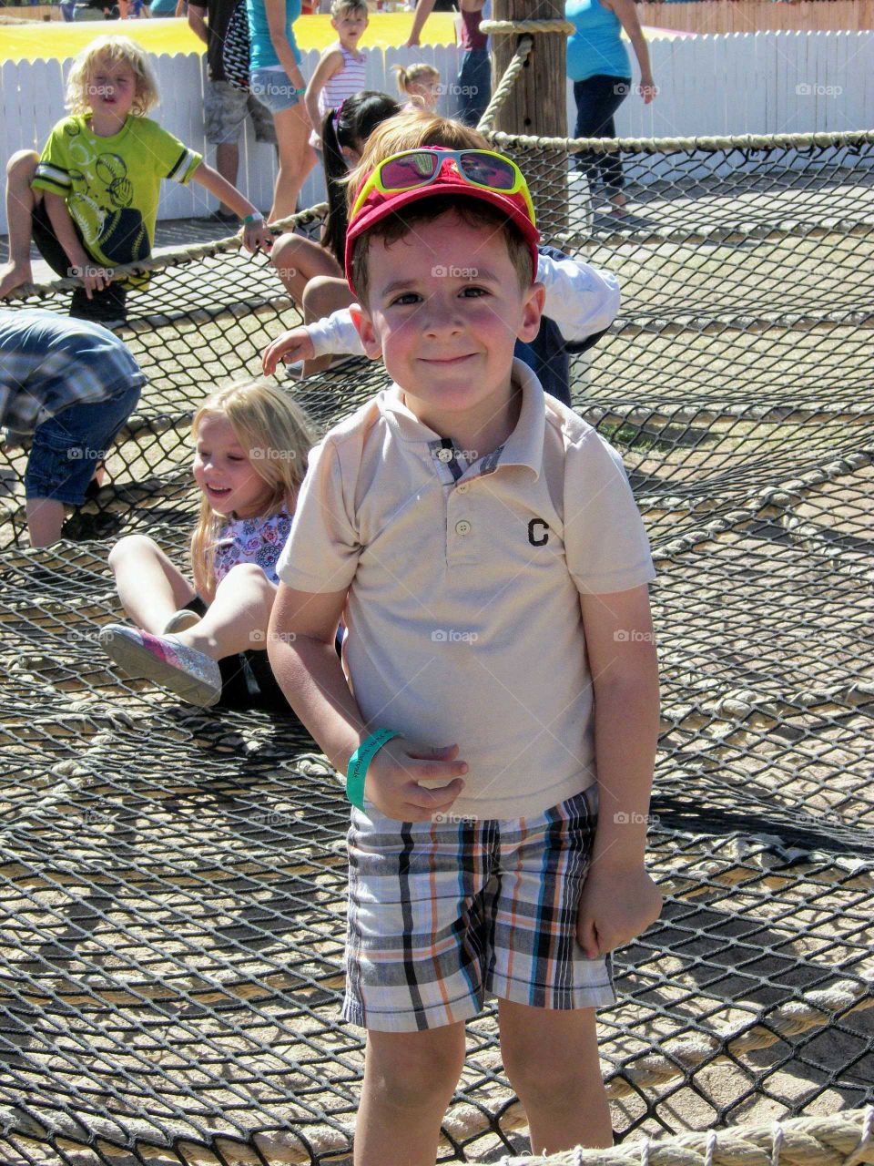 Boy on cargo net
