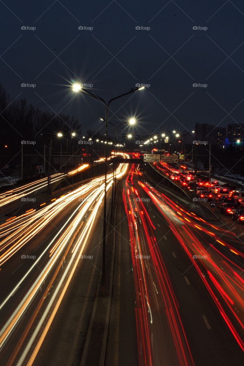 Night road leading to the mountains