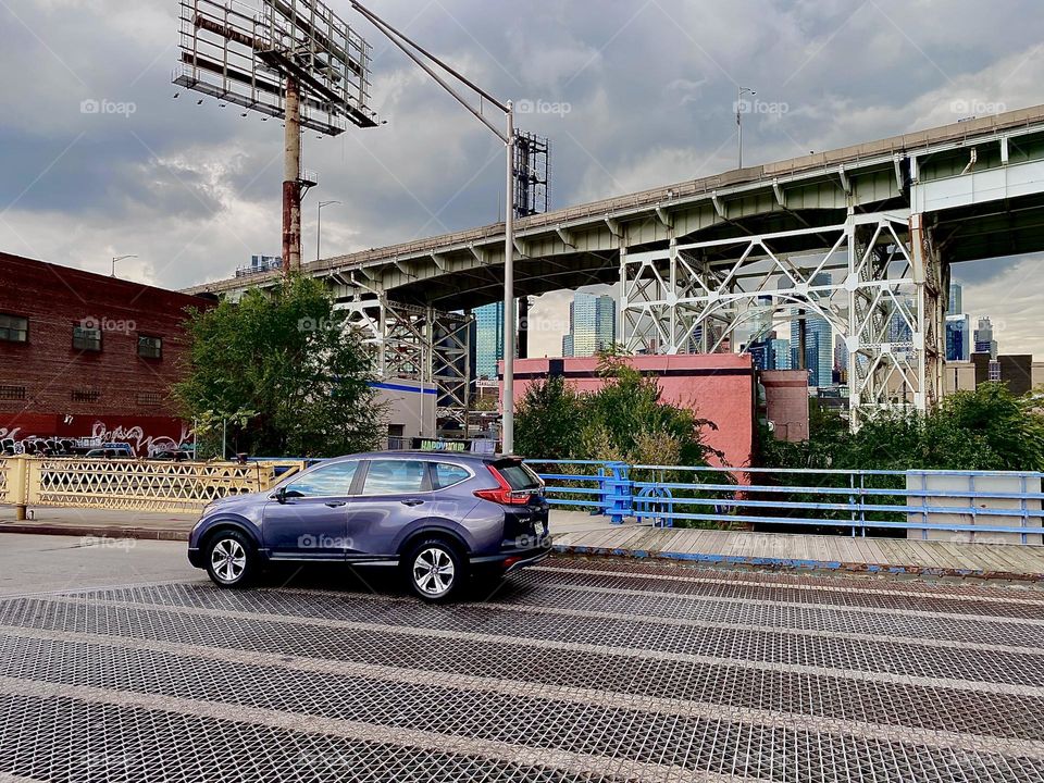 This is a spectacular view of the “Brooklyn Queens Expressway”, short “BQE” overpass running parallel to “Borden Ave” and the “Borden Ave Bridge” over “Dutch Kills” in LIC, Queens. 2023. Hypnotic Productions