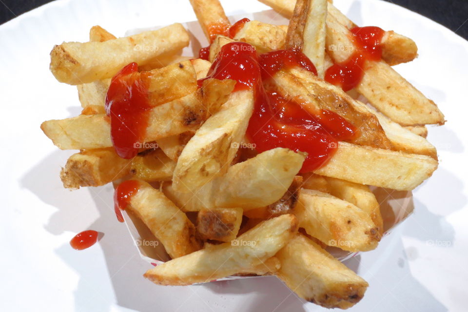 fresh french fries with ketchup