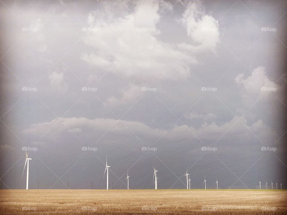 Windmills on an open Kansas field