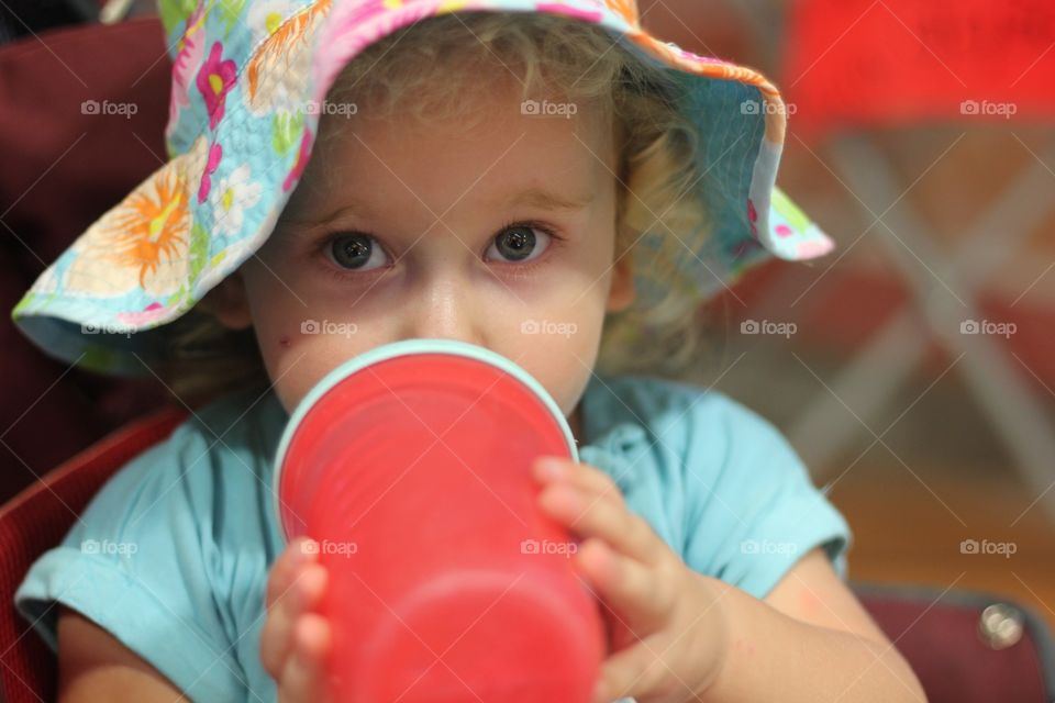 Toddler drink a water 