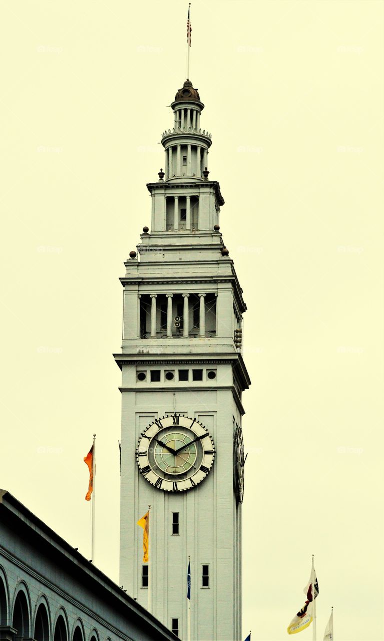 City street view of a clock tower in downtown San Francisco