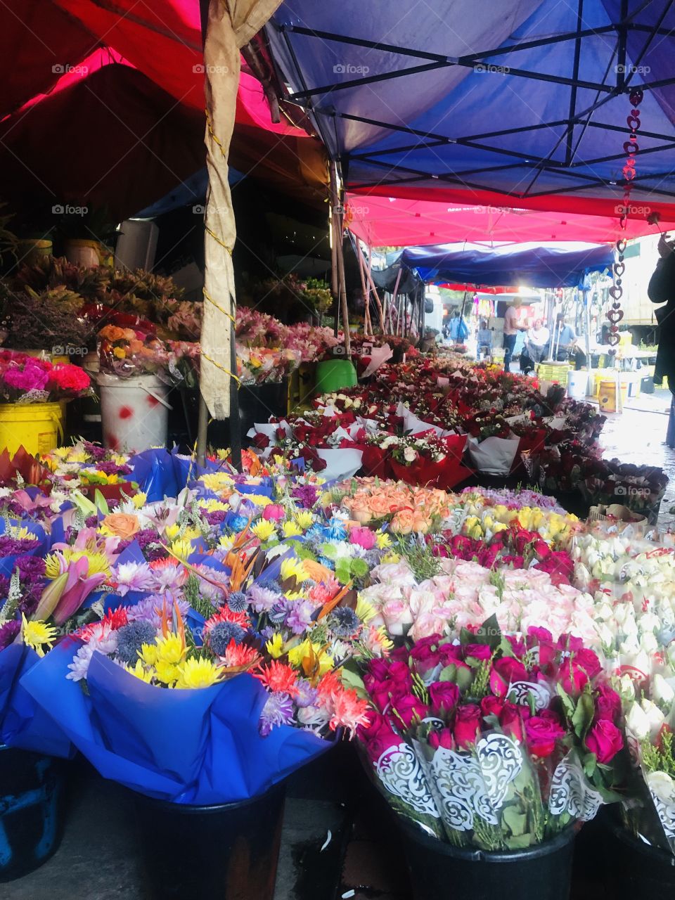 Colorful flower market in city street 