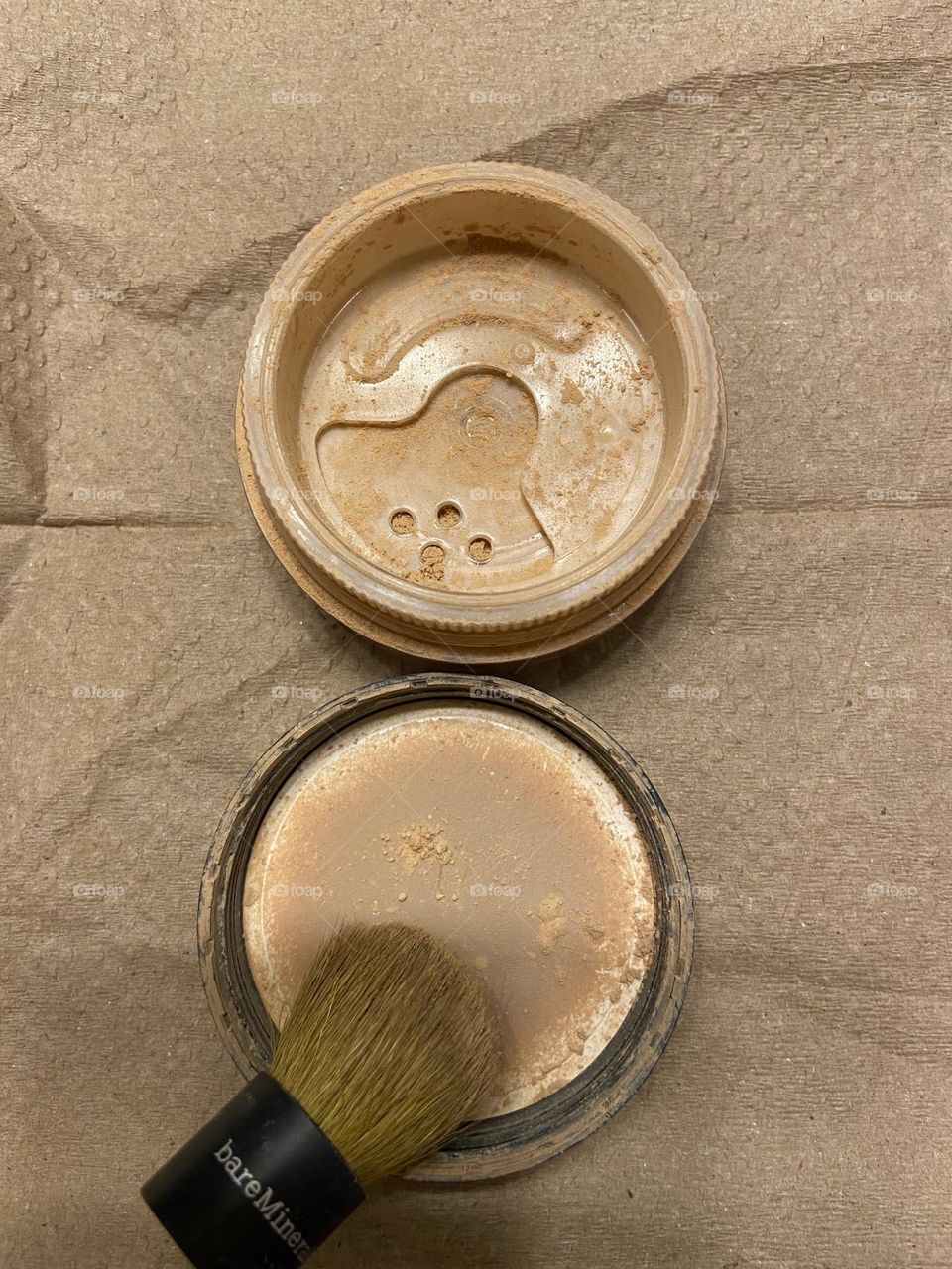 I use different beauty products, but I always go back to Bare Minerals Original Foundation or Matte Foundation. This is Matte Foundation in Light Beige. It looks natural on and not like you are wearing makeup.