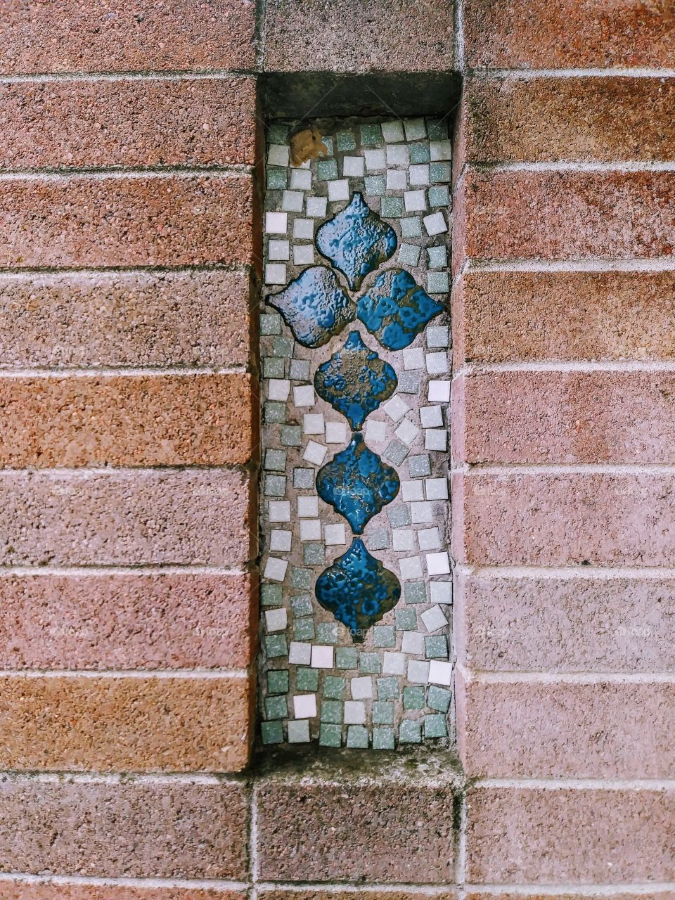mosaic of teal cross