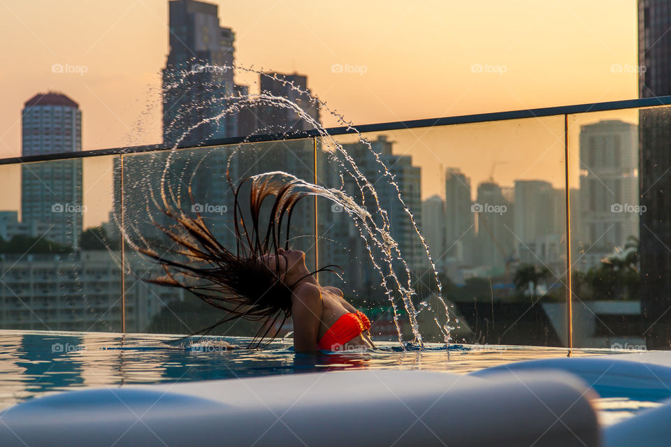 Golden hour. Relaxing evening at the pool