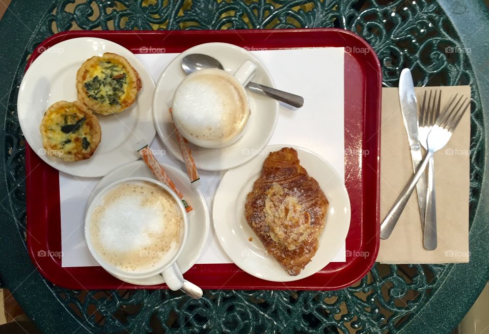 Quiche, croissant and lattes