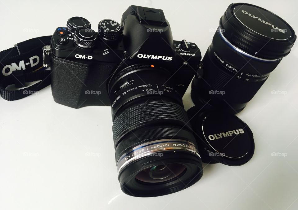 Photography equipments. Camera- Olympus OM-D E-M10 Mark II /Lenses- Olympus M.ZUIKO 12-50mm / M.ZUIKO 40-150mm /Lens cap