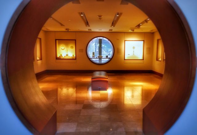 Crowe Museum of Asian Art Exhibit Room with a circle door and window