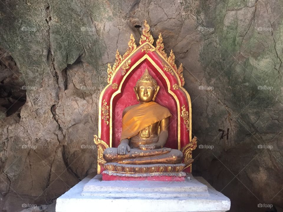 Shrine at the underground cave Buddhist temple.